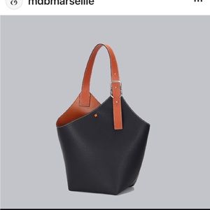 Gently used bucket bag